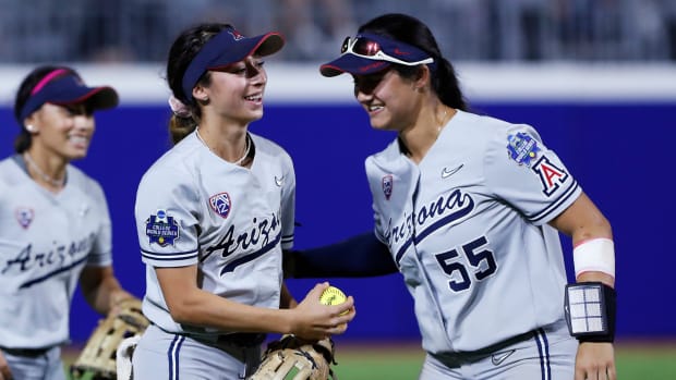 Arizona outfielder Jasmine Perezchica celebrates with Giulia Koutsoyanopulos.